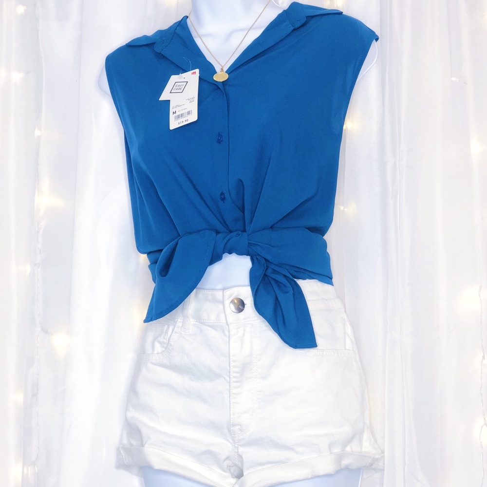 Sleeveless button up collared teal shirt retro